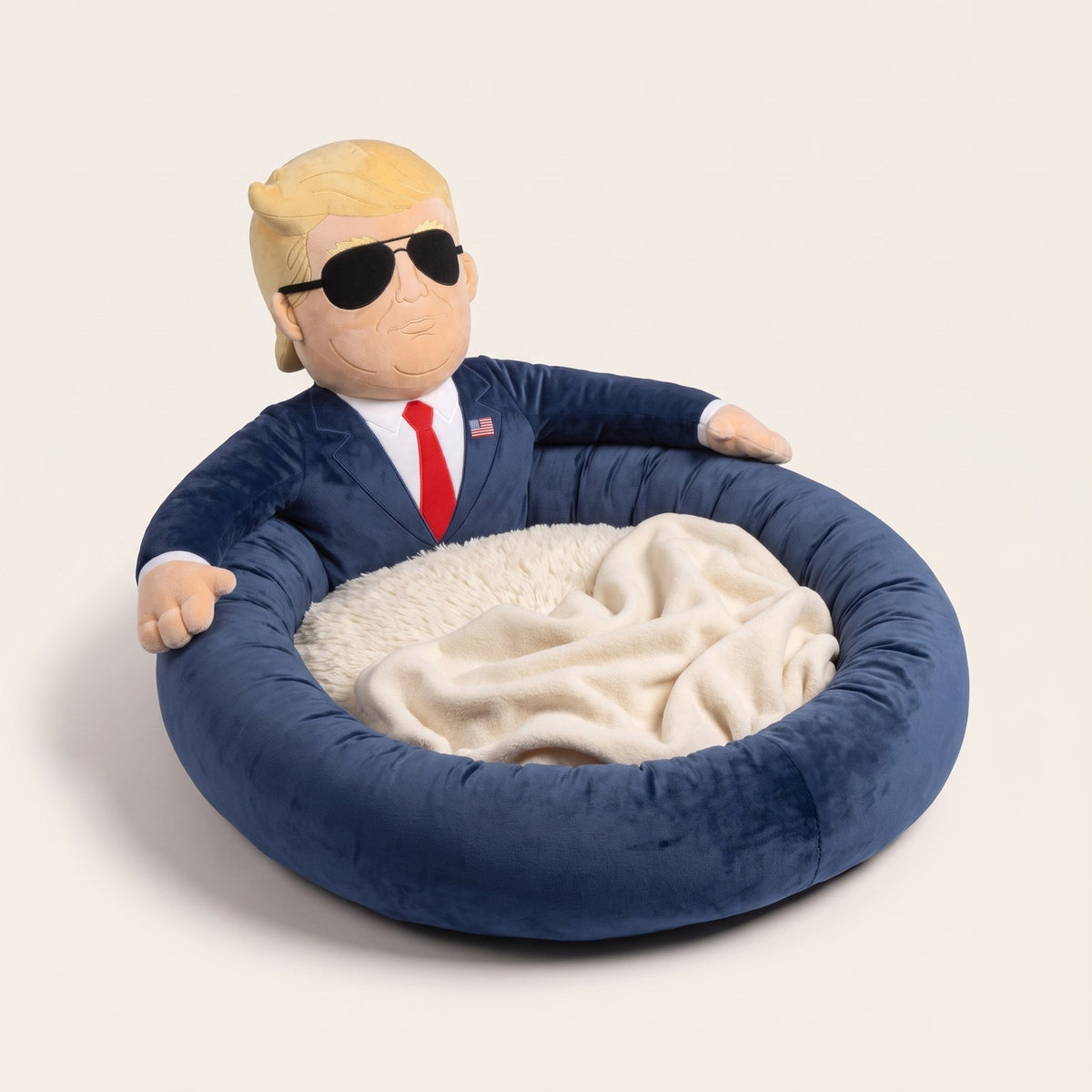 First Dog Bed: navy velvet bolster dog bed with a plush President in a suit, red tie and aviators